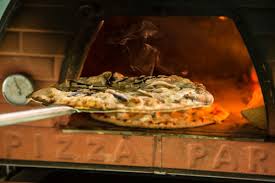 Proef de smaak van Italiaanse passie met onze pizzakraam aan huis!